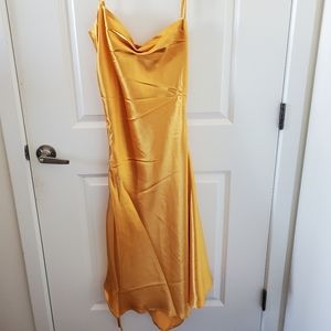 Miss Circle gold satin side slit dress. Medium